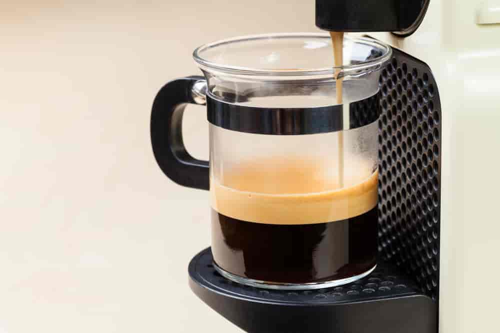 making espresso with capsule coffee machine
