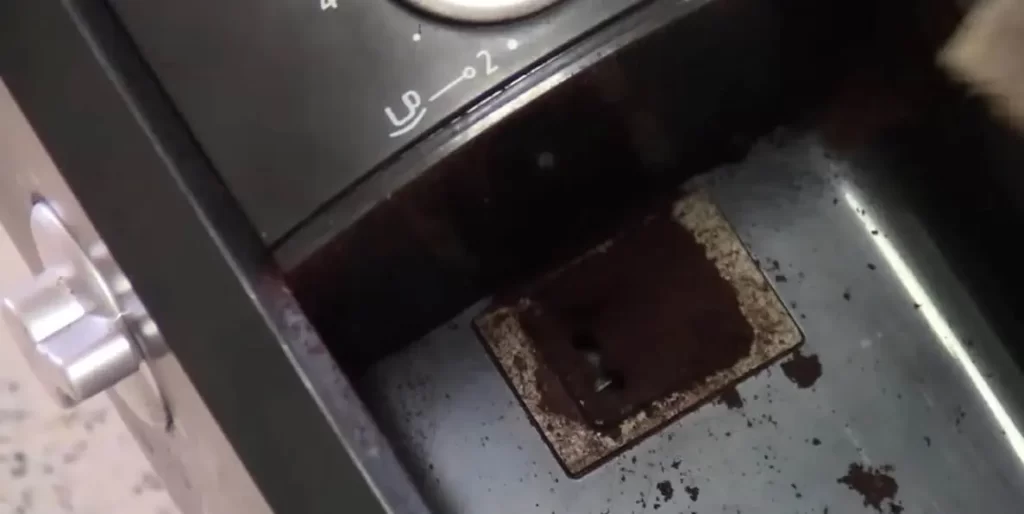 cleaning a Krups coffee grinder