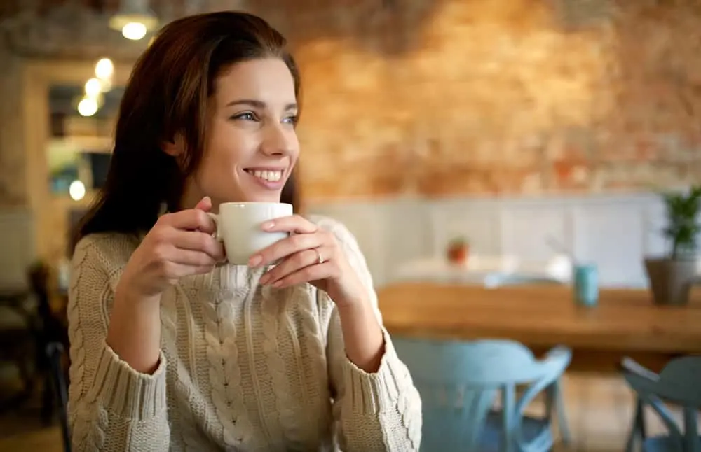 A girl drinking coffee