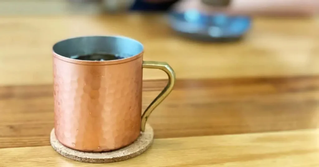 Drink Coffee In A Copper Cup